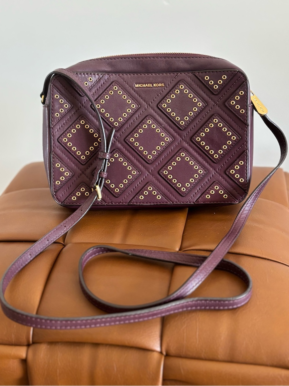 Michael Kors Plum Quilted Crossbody with Gold Eyelet Detail